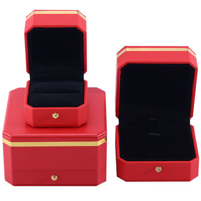 購入 注目すべき赤色八角形 PU革の高級包装箱 金色トリミング online manufacture
